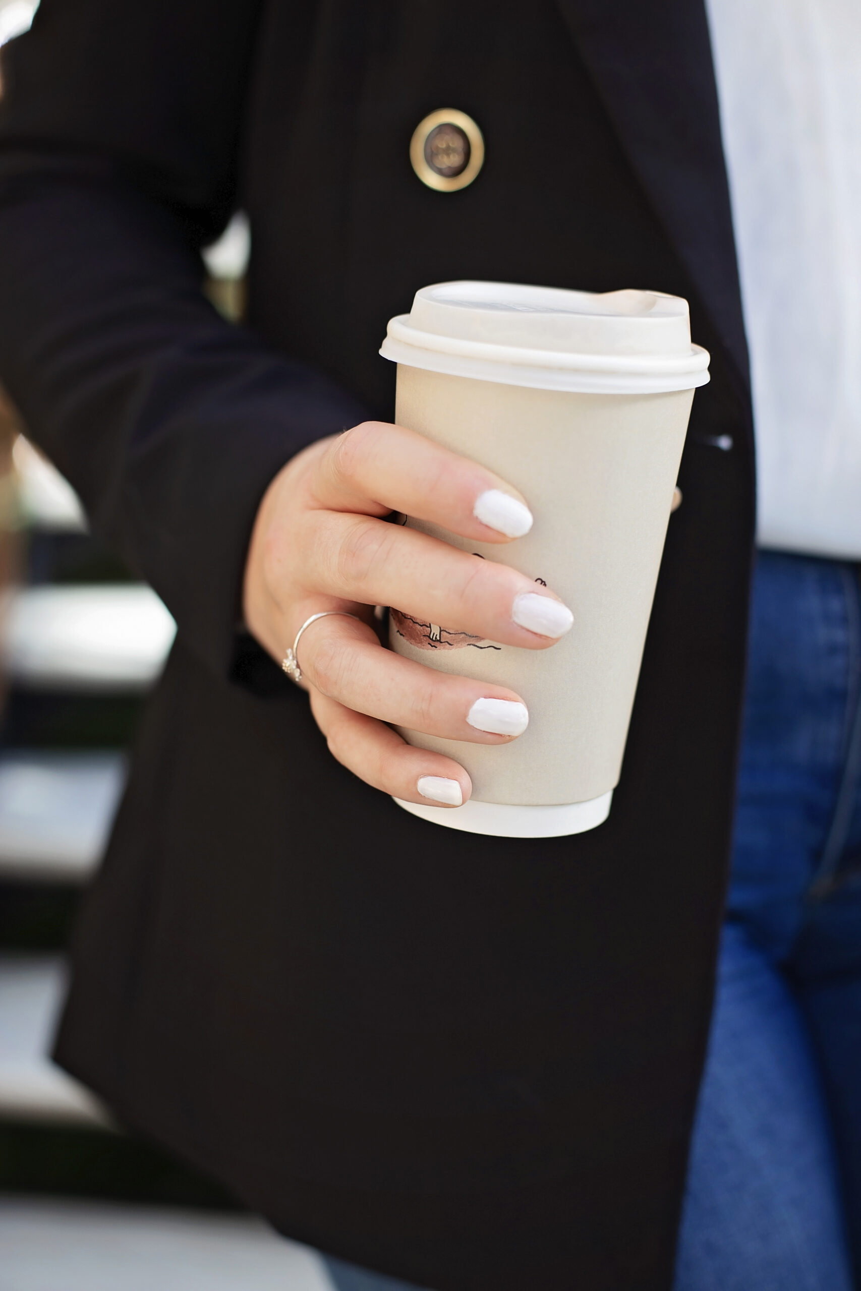 forme team holding coffee at meeting