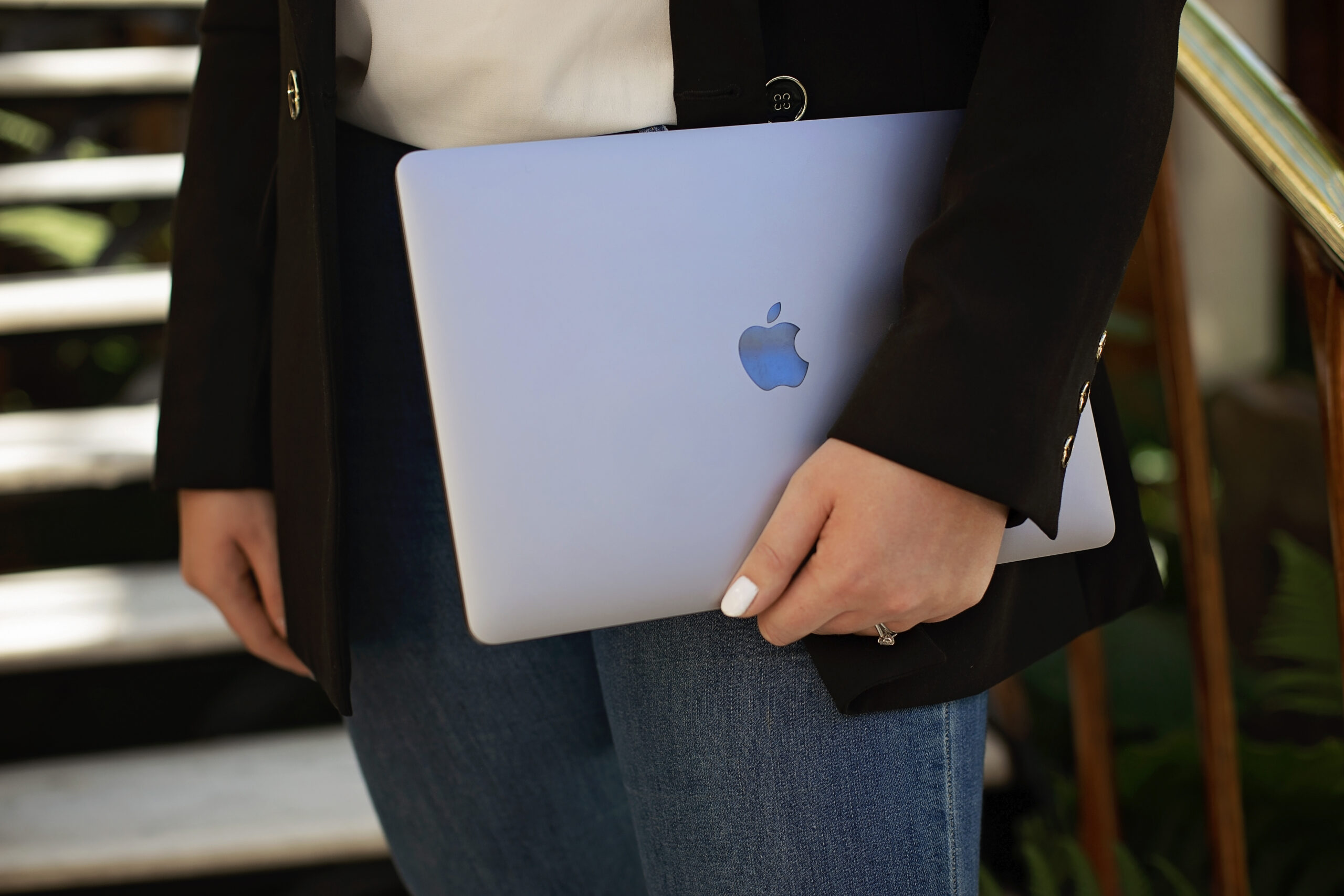 creative team holding laptop